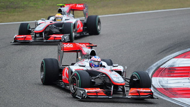 Cina: gara bagnata, Button vince e convince