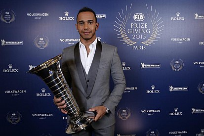 Hamilton collects F1 championship trophy at FIA Gala