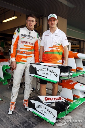 Paul di Resta, Sahara Force India F1 and team mate Nico Hulkenberg, Sahara Force India F1 with competition winners Wendy and Keith Murray branding on the Sahara Force India F1 VJM05