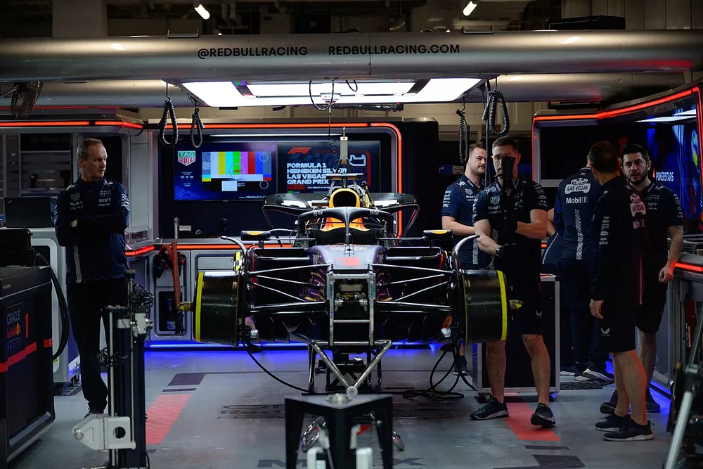 Mechanics in the garage with the car of Max Verstappen, Red Bull Racing RB19