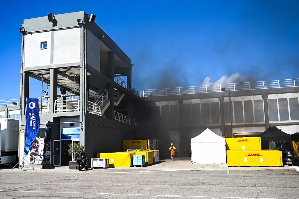 Smoke from the pit lane