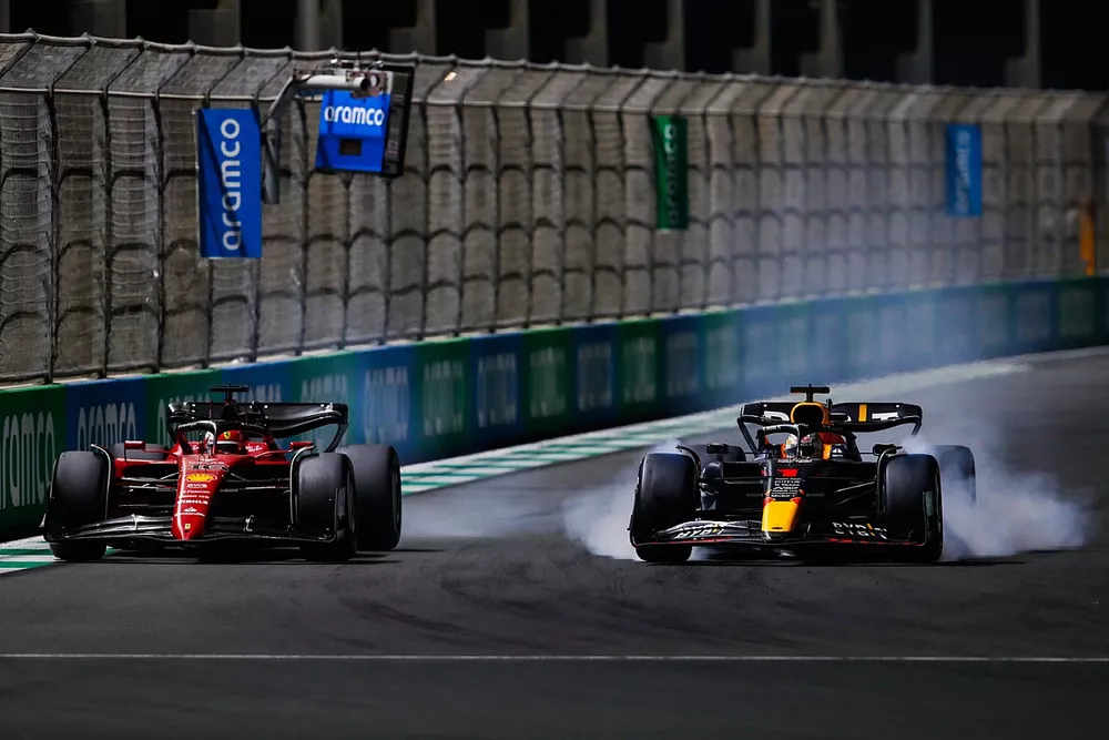 Charles Leclerc, Ferrari F1-75, Max Verstappen, Red Bull Racing RB18, battle for the lead