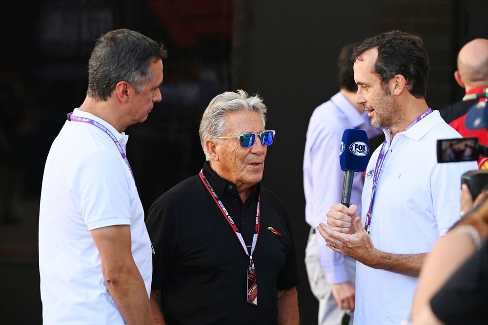 Former F1 world champion Mario Andretti is interviewed