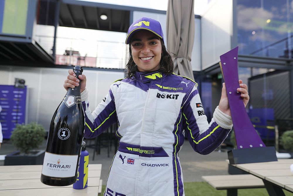 Jamie Chadwick, 1st position, with her trophy and Champagne