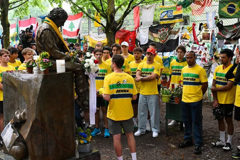 Sebastian Vettel holds a speech at the Ayrton Senna memorial statue