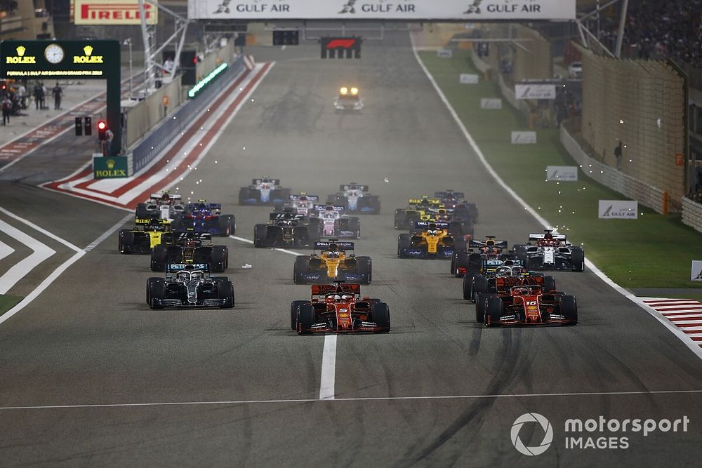 Sebastian Vettel, Ferrari SF90, leads Charles Leclerc, Ferrari SF90, Lewis Hamilton, Mercedes AMG F1 W10, Valtteri Bottas, Mercedes AMG W10, Max Verstappen, Red Bull Racing RB15, Kevin Magnussen, Haas F1 Team VF-19, and the rest of the field at the start