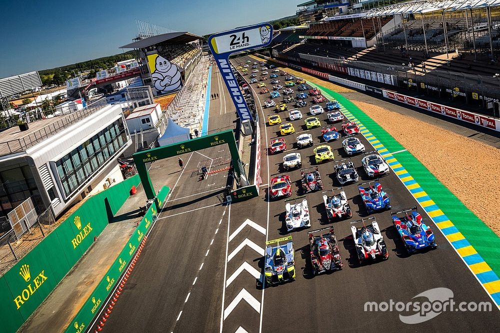 Official group photo with all cars
