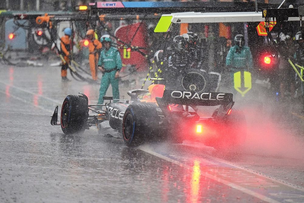 Sergio Perez, Red Bull Racing RB19, makes a pit stop