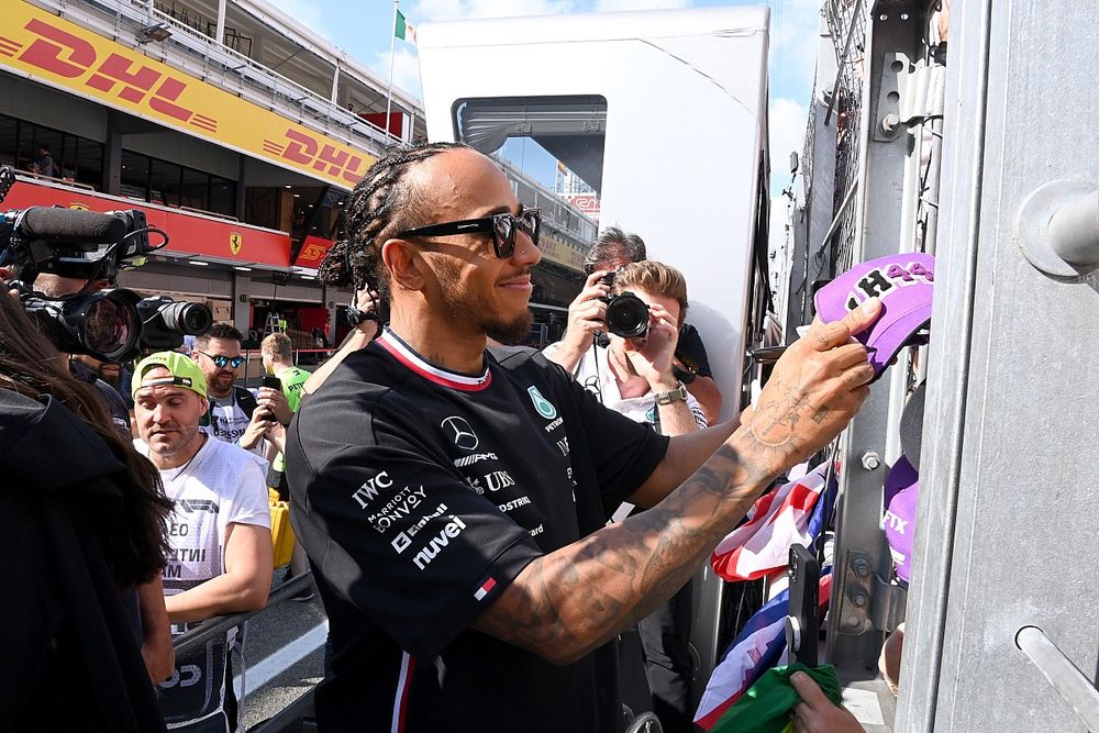 Lewis Hamilton, Mercedes-AMG, 2nd position, signs autographs for fans after the race