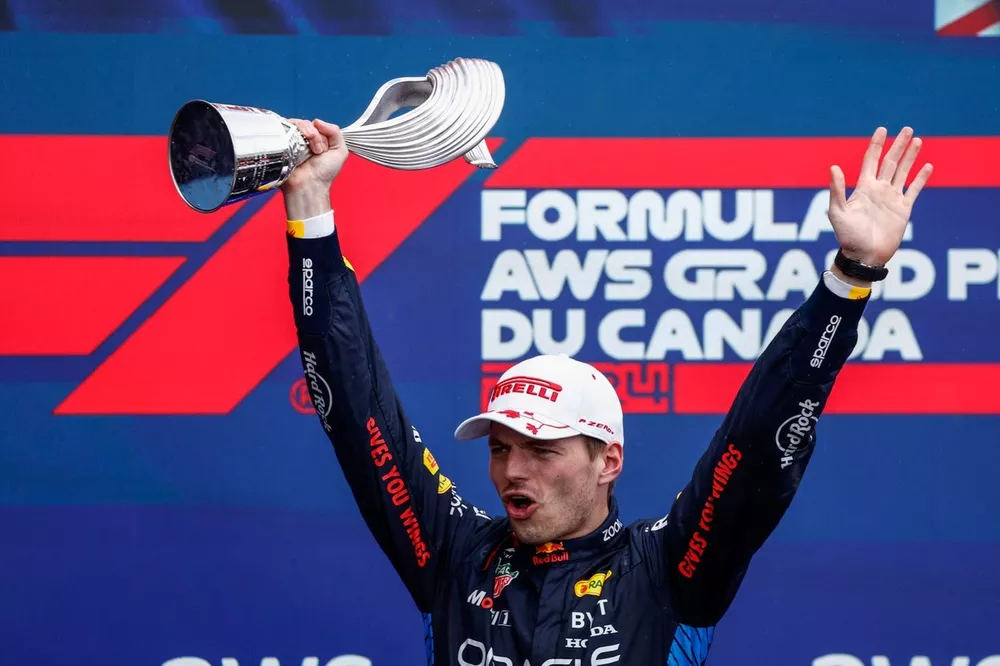 Max Verstappen, Red Bull Racing, 1st position, lifts the winners trophy