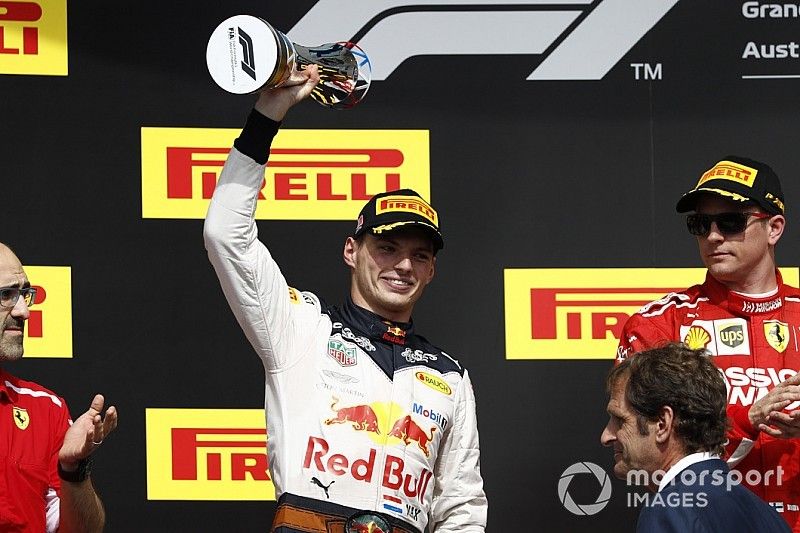 Carlos Santi, Race Engineer, Ferrari, Max Verstappen, Red Bull Racing, 2nd position, with his trophy, and Kimi Raikkonen, Ferrari, 1st position, on the podium