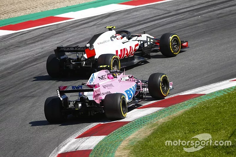 Kevin Magnussen, Haas F1 Team VF-18, en lutte avec Esteban Ocon, Force India VJM11