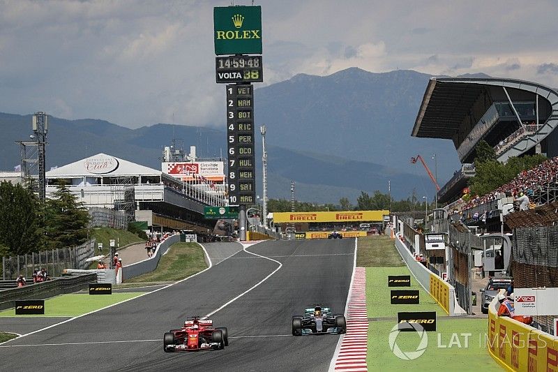 Sebastian Vettel, Ferrari SF70H y Lewis Hamilton, Mercedes-Benz F1 W08