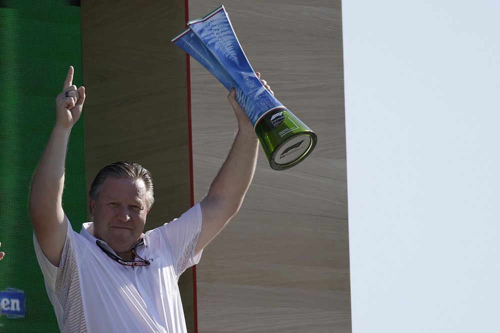 Zak Brown, CEO, McLaren Racing, with the Constructors trophy