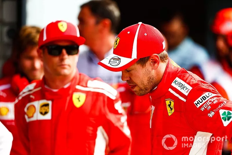 Front row starters, pole man Kimi Raikkonen, Ferrari, and Sebastian Vettel, Ferrari