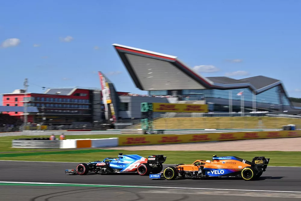 Fernando Alonso, Alpine A521, Lando Norris, McLaren MCL35M