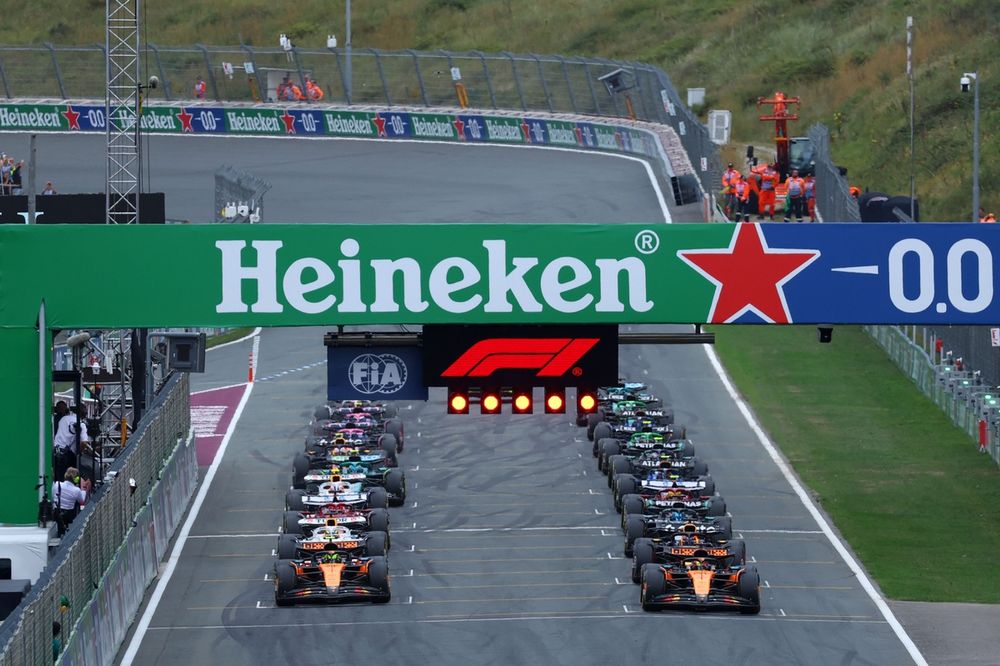 Cars line up on the grid for the race start.
