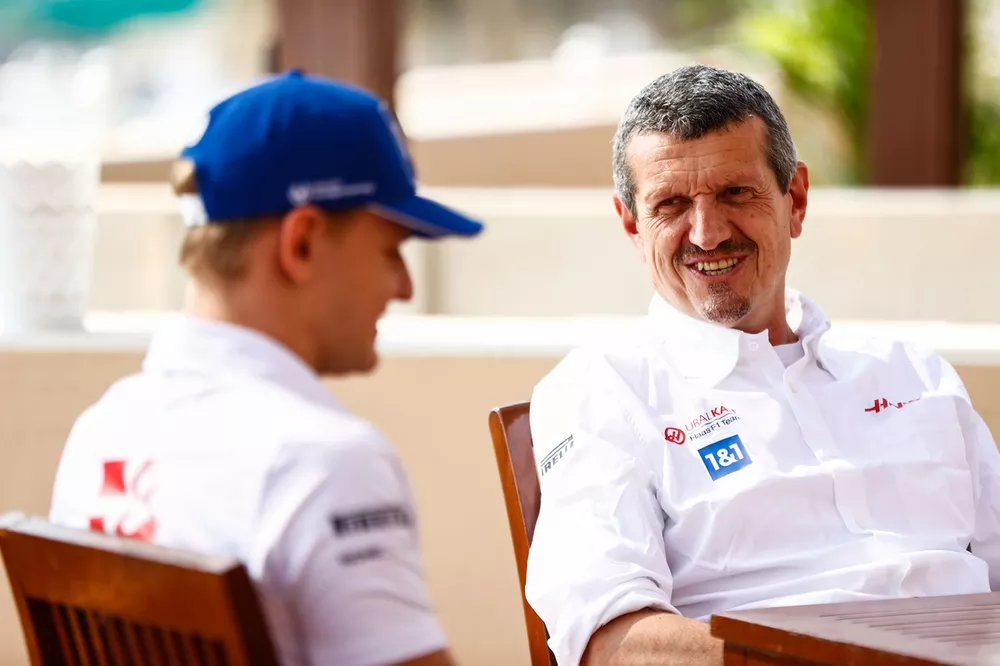 Guenther Steiner, Team Principal, Haas F1, and Mick Schumacher, Haas F1