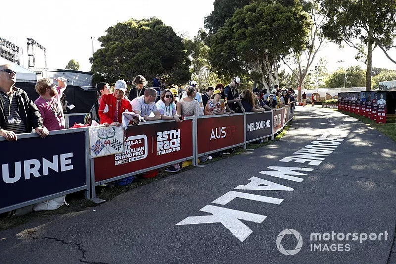 Fans line the walk to the paddock