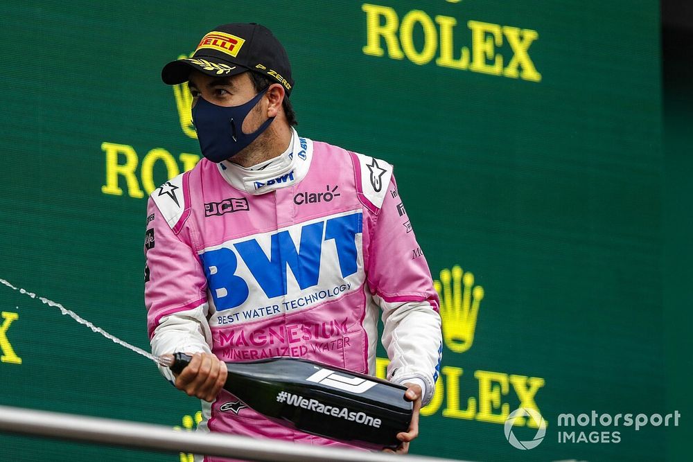 Sergio Perez, Racing Point, 2nd position, sprays Champagne on the podium