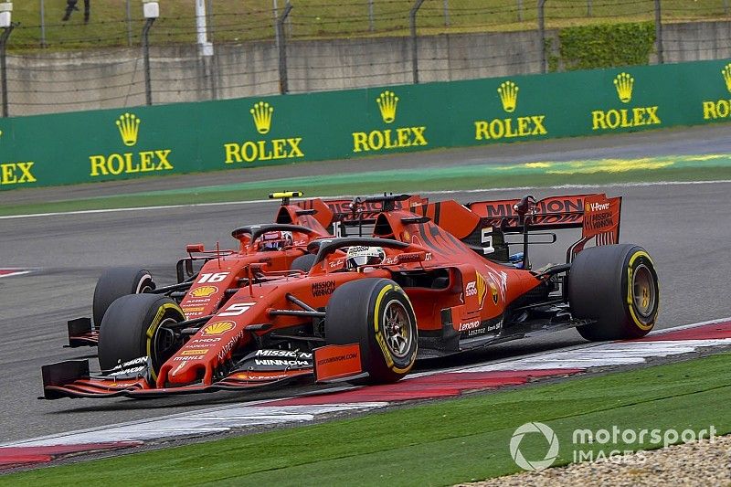 Sebastian Vettel, Ferrari SF90, leads Charles Leclerc, Ferrari SF90