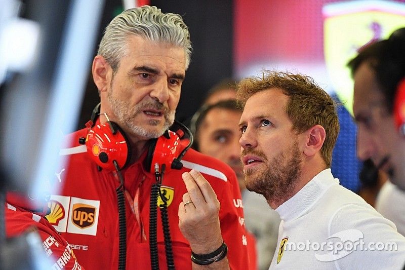 Sebastian Vettel, Ferrari and Maurizio Arrivabene, Ferrari Team Principal