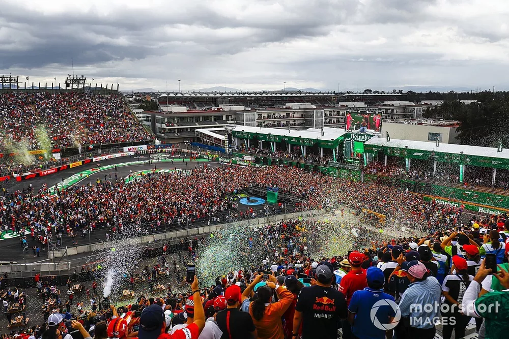 Fans invade the circuit after the race for the podium ceremony