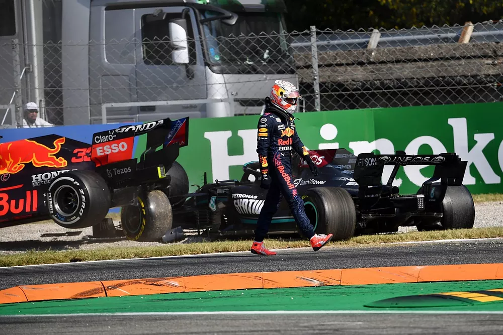 Max Verstappen, Red Bull Racing, walks away from his car after colliding with Lewis Hamilton, Mercedes W12