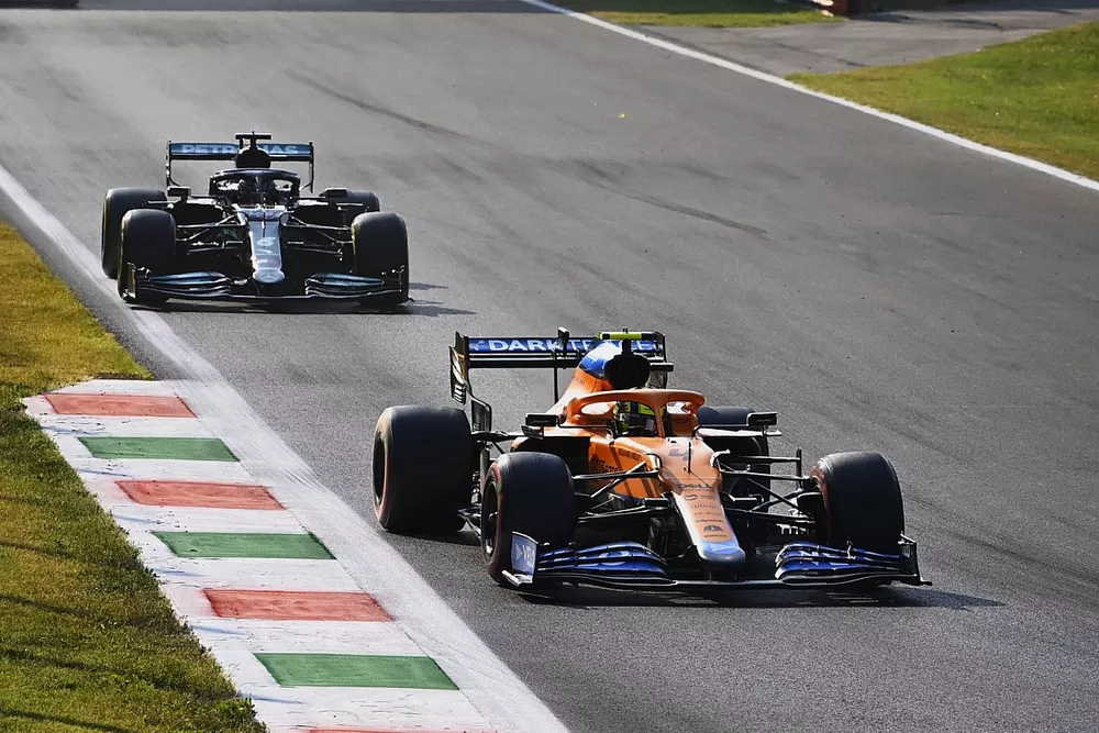 Lando Norris, McLaren MCL35M, Lewis Hamilton, Mercedes W12, and Charles Leclerc, Ferrari SF21