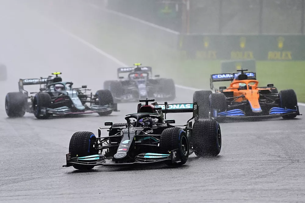 Lewis Hamilton, Mercedes W12, Daniel Ricciardo, McLaren MCL35M, and Sebastian Vettel, Aston Martin AMR21