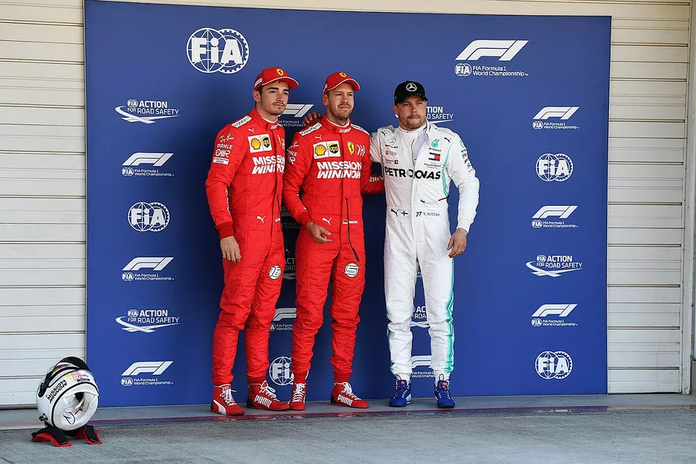 Top three qualifiers Charles Leclerc, Ferrari, pole man Sebastian Vettel, Ferrari, and Valtteri Bottas, Mercedes AMG F1