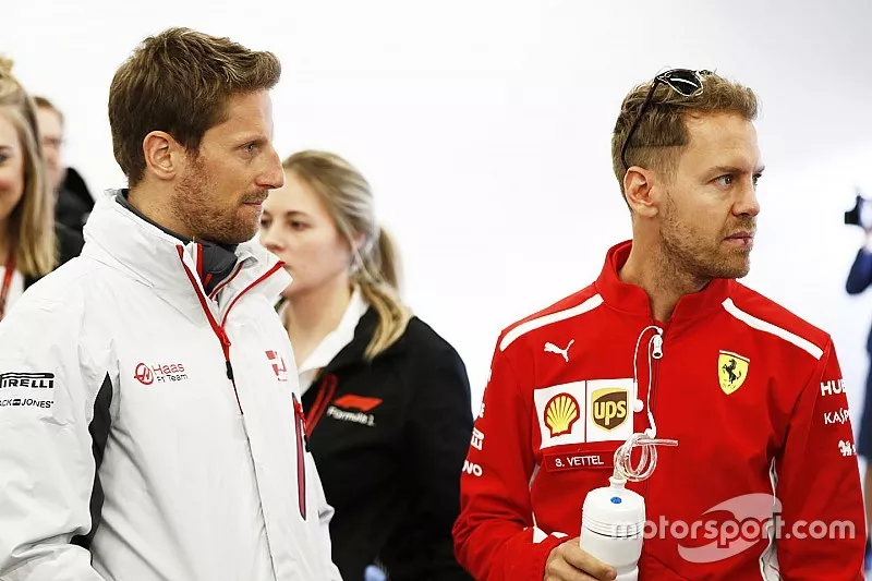 Romain Grosjean, Haas F1 Team, Sebastian Vettel, Ferrari