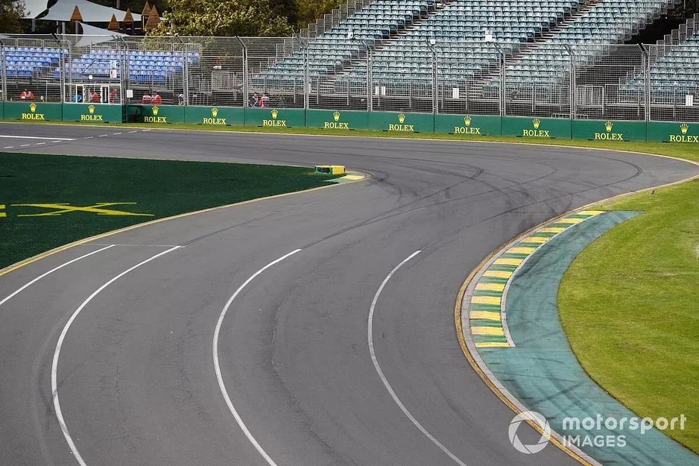Empty track and grandstands at turn 1