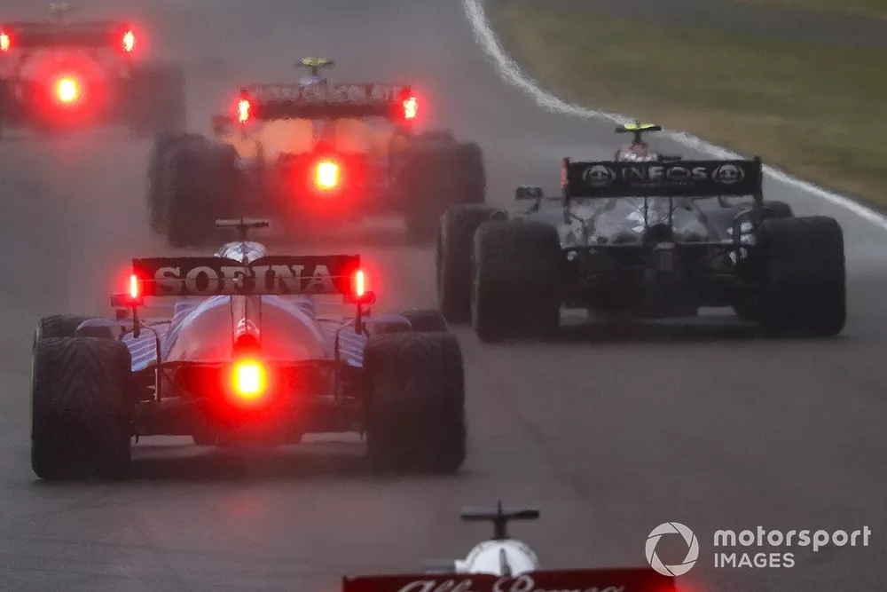 Lando Norris, McLaren MCL35M, Valtteri Bottas, Mercedes W12, and George Russell, Williams FW43B