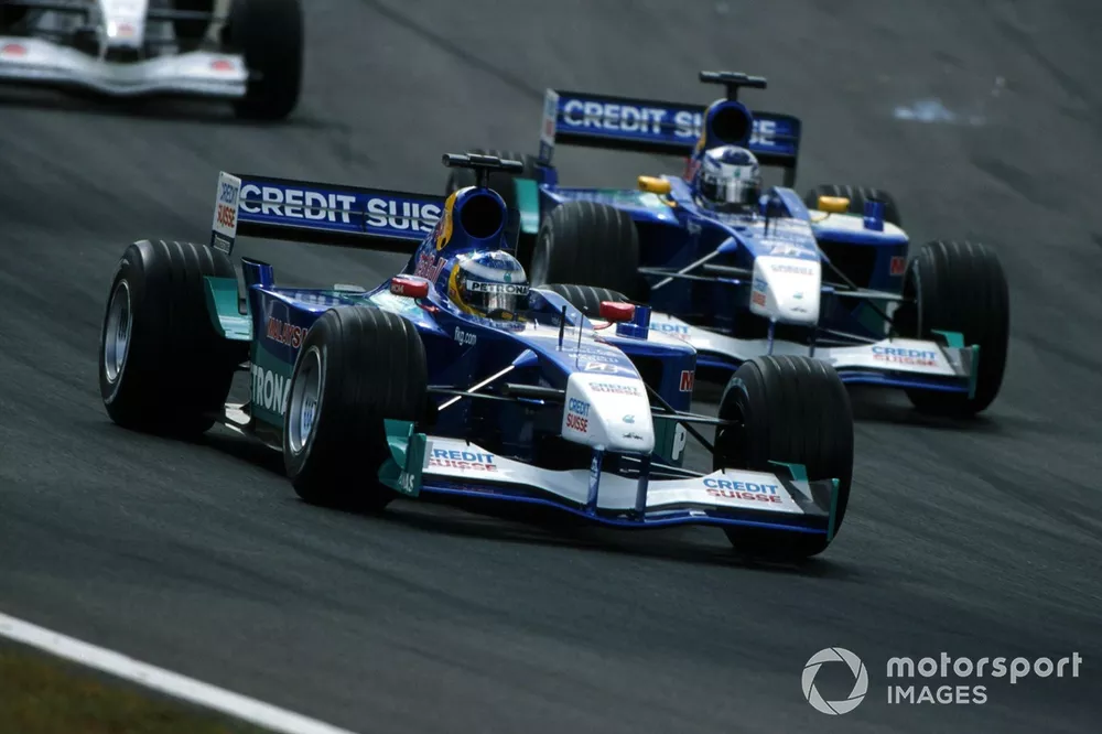 Nick Heidfeld, Sauber C20, leads team mate Kimi Raikkonen  