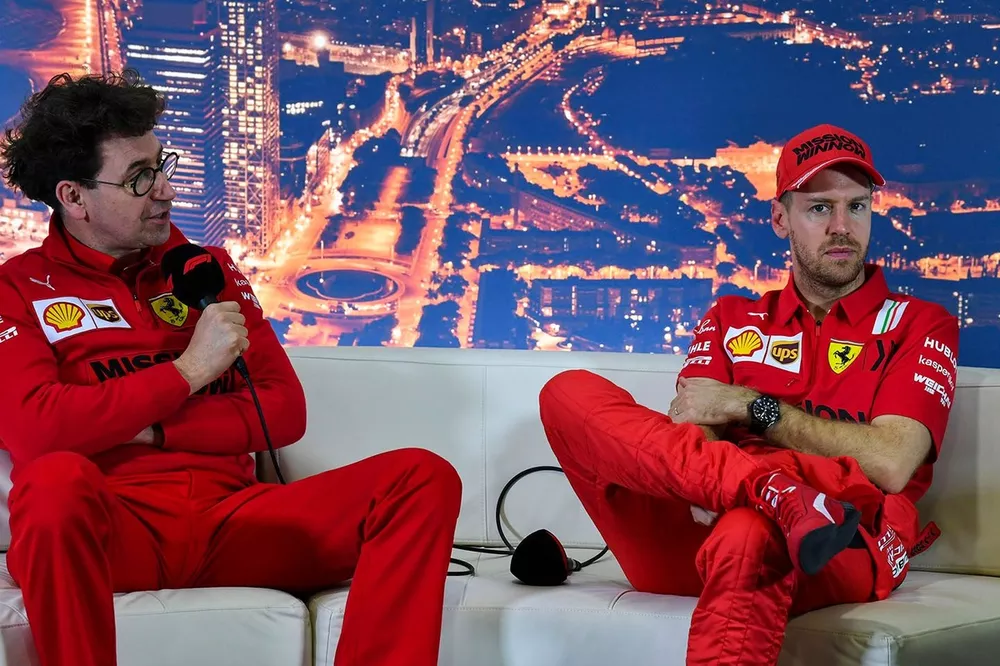 Mattia Binotto, Team Principal Ferrari, and Sebastien Vettel, Ferrari 