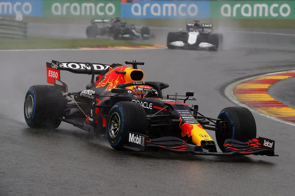 Max Verstappen, Red Bull Racing RB16B, George Russell, Williams FW43B, and Sir Lewis Hamilton, Mercedes W12