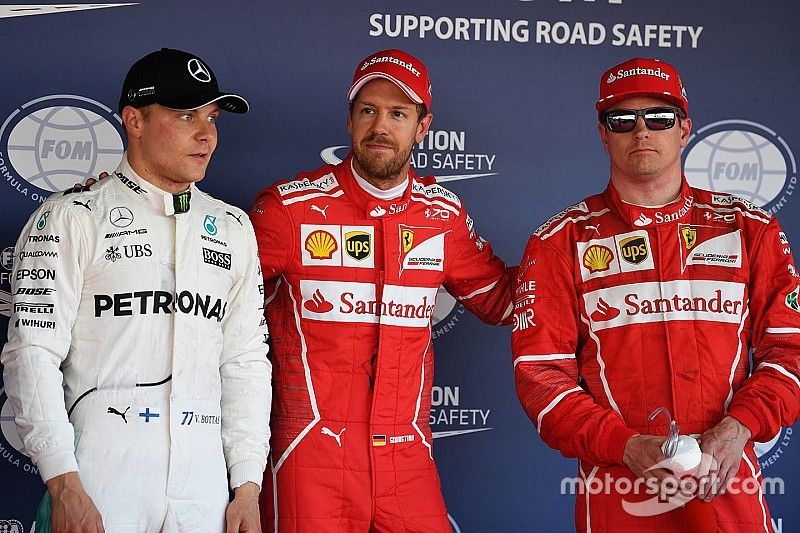 Ganador de la pole Sebastian Vettel, Ferrari, segundo lugar Kimi Raikkonen, Ferrari y el tercero Val
