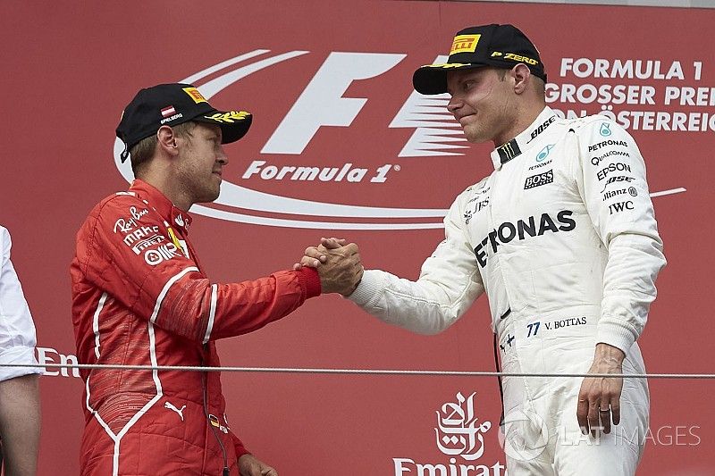 Segundo, Sebastian Vettel, Ferrari, ganador, Valtteri Bottas, Mercedes AMG F1