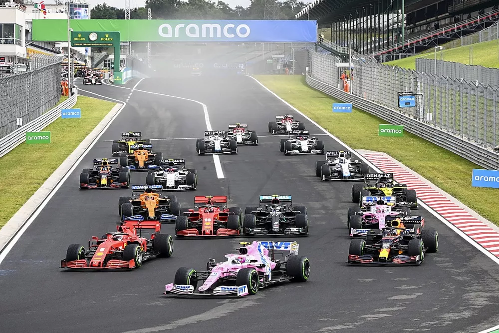 Lance Stroll, Racing Point RP20, leads Max Verstappen, Red Bull Racing RB16, Sebastian Vettel, Ferrari SF1000, Valtteri Bottas, Mercedes F1 W11, Charles Leclerc, Ferrari SF1000, at the start