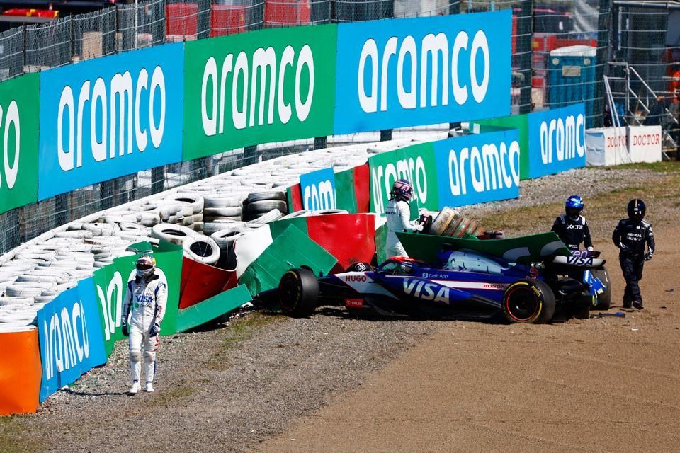 The cars of Daniel Ricciardo, RB F1 Team VCARB 01 and Alex Albon, Williams FW46 in the tyre barrier after they crashed on the opening lap