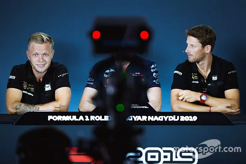 Kevin Magnussen, Romain Grosjean, Haas F1 Team at press-conference