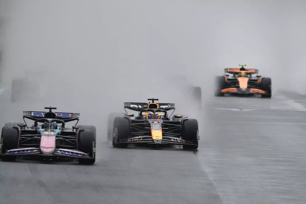 Max Verstappen, Red Bull Racing RB20, overtakes Esteban Ocon, Alpine A524 