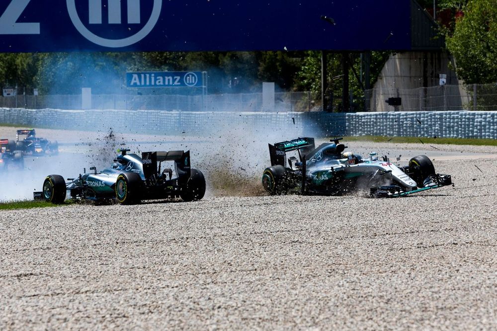 Lewis Hamilton, Mercedes AMG F1 W07 Hybrid and Nico Rosberg, Mercedes AMG F1 W07 Hybrid collide on the opening lap 
