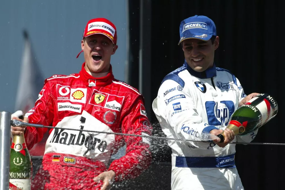 Podium: Race winner Michael Schumacher, Ferrari, third place Juan Pablo Montoya, Williams