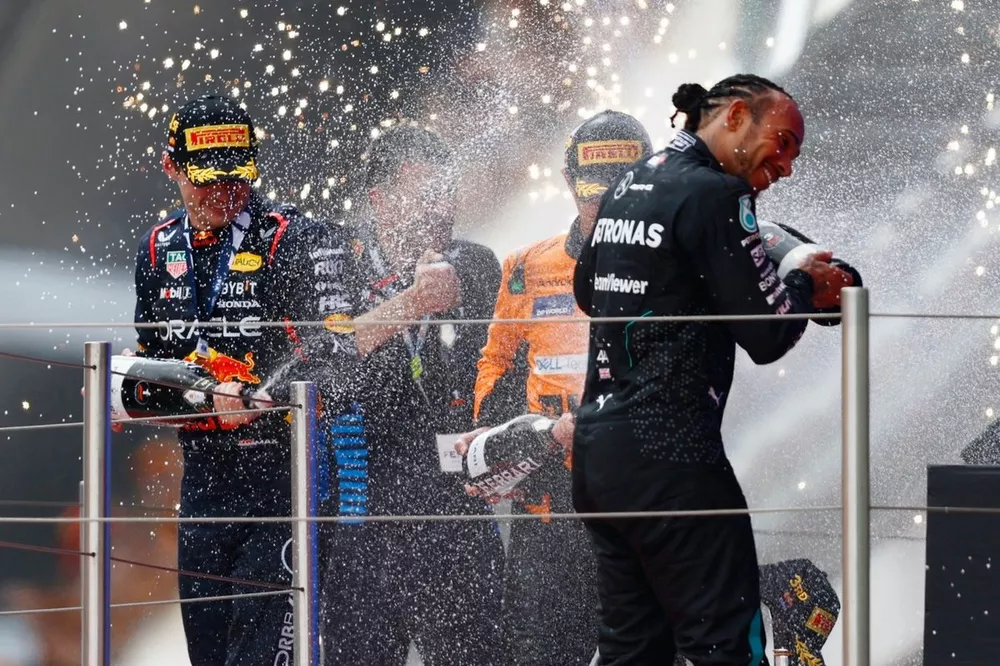Max Verstappen, Red Bull Racing, 1st position, sprays champagne in celebration at Lewis Hamilton, Mercedes-AMG F1 Team, 3rd position, on the podium 