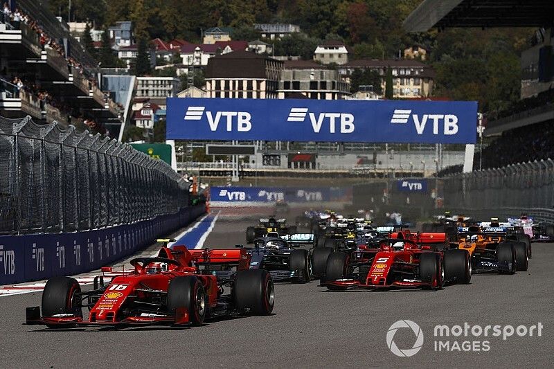 Charles Leclerc, Ferrari SF90, leads Sebastian Vettel, Ferrari SF90, Lewis Hamilton, Mercedes AMG F1 W10, Carlos Sainz Jr., McLaren MCL34, Valtteri Bottas, Mercedes AMG W10, and the rest of the field at the start