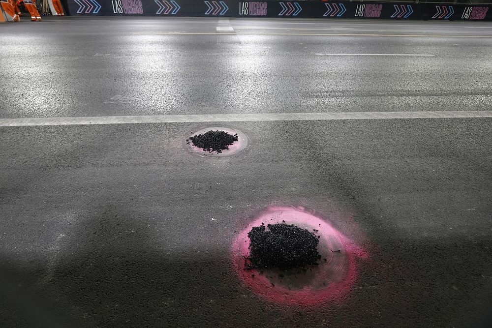 Manhole under repair on the circuit