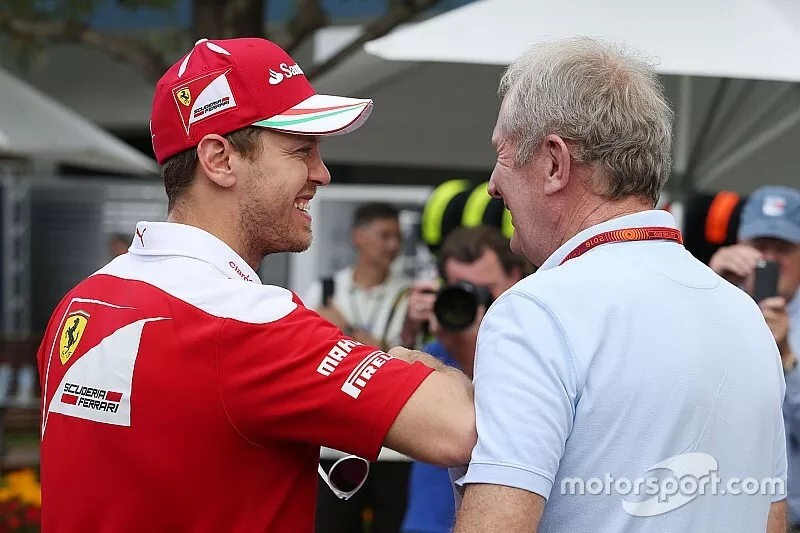 Sebastian Vettel, Ferrari with Dr Helmut Marko, Red Bull Motorsport Consultant