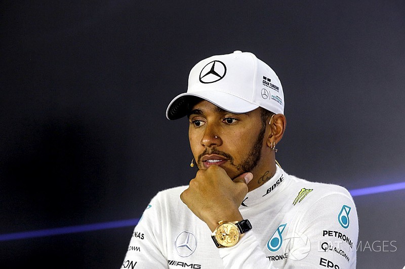 Hamilton admits to dilemma over staying in Formula 1